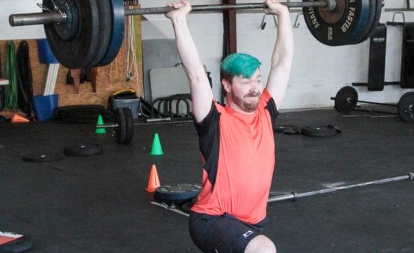 Man lift weights at Commonwealth Crossfit